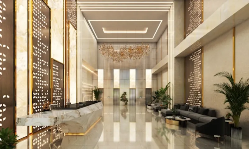 Modern hotel lobby with sleek reception desk and seating