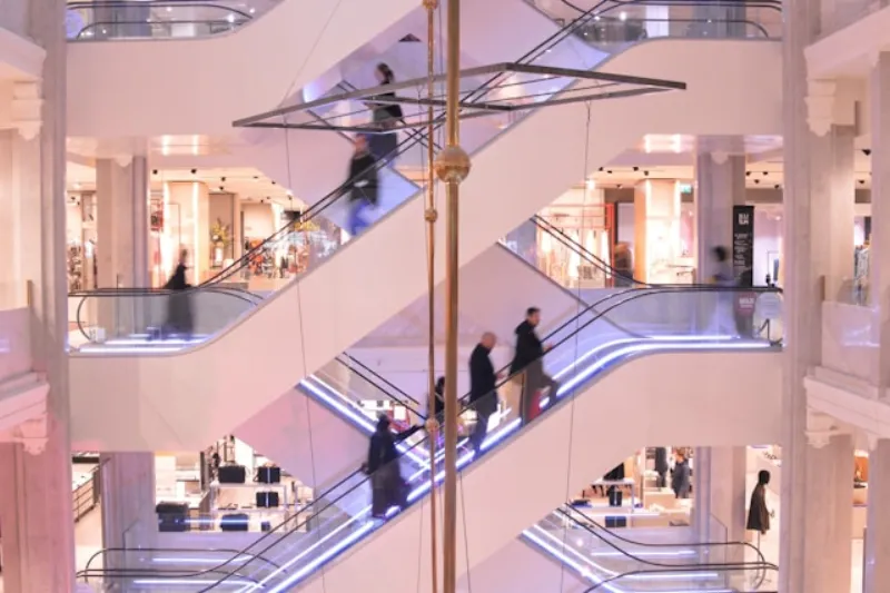 People walking through a modern shopping centre